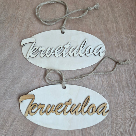 Tervetuloa -kyltti